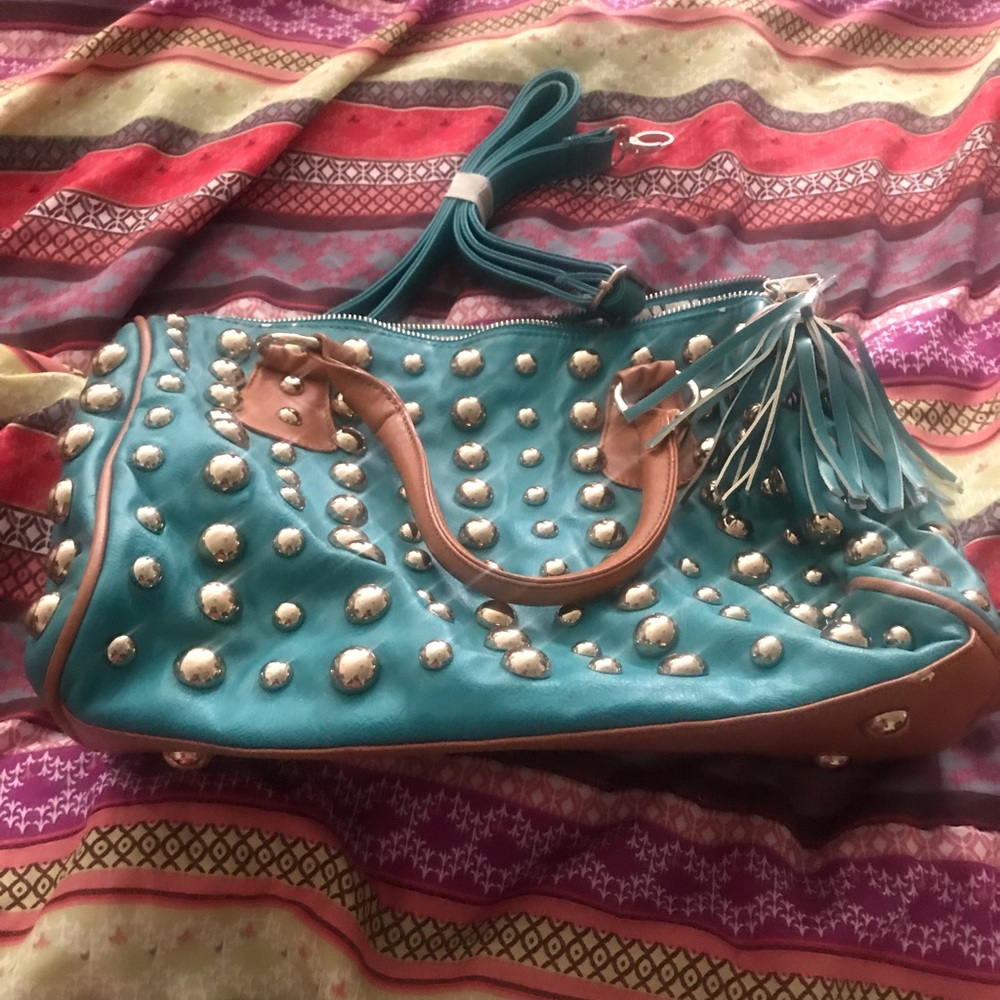 Turquoise stud purse.